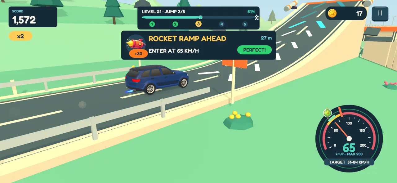 A blue SUV approaching a rocket ramp, with a card reading Rocket ramp ahead, enter at 65 km/h